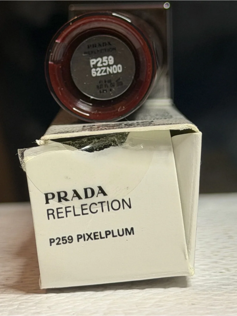 Prada Reflection Lip Gloss in Deep Plum